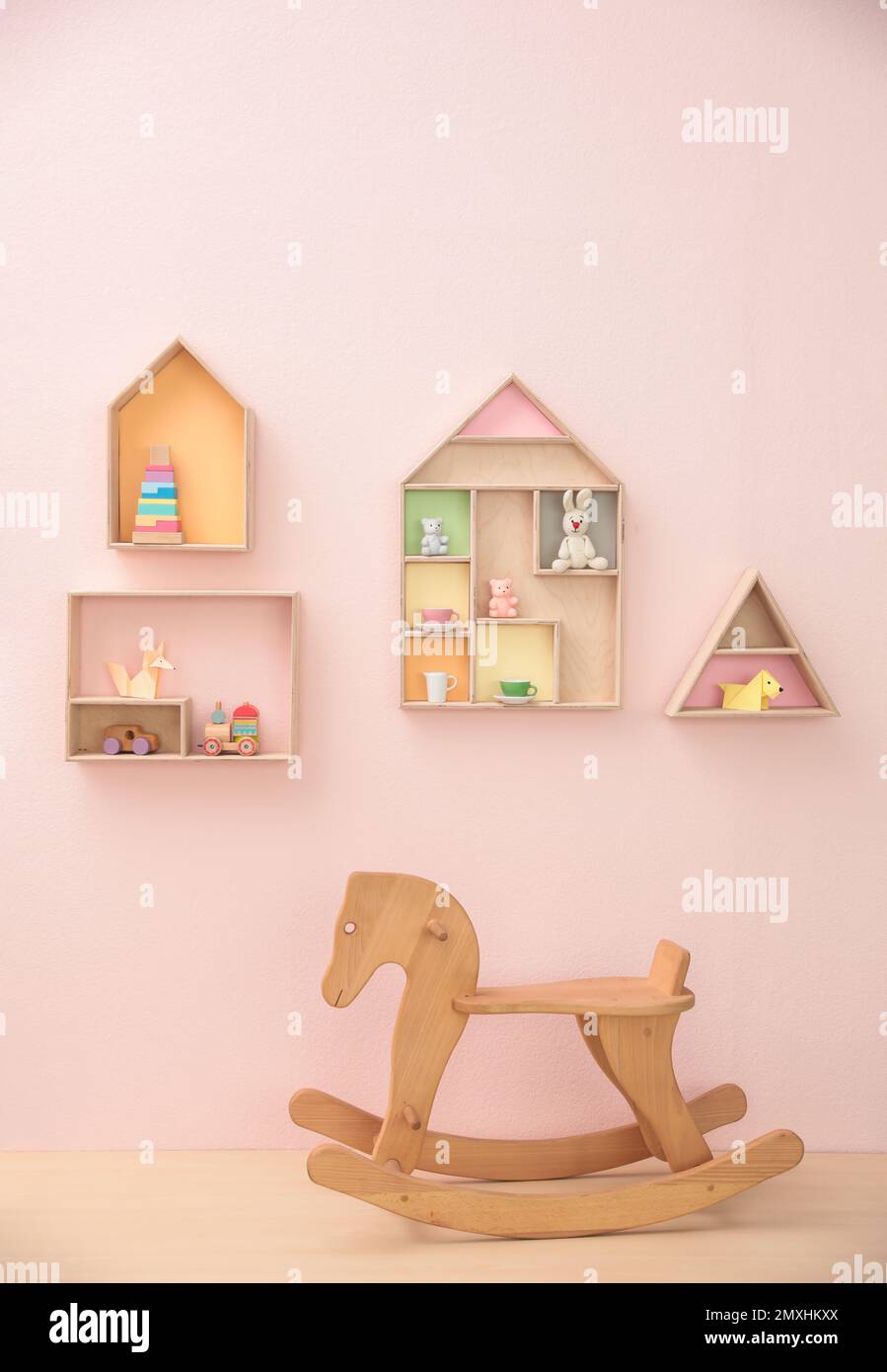 Stylish baby room interior design with house shaped shelves and rocking ...