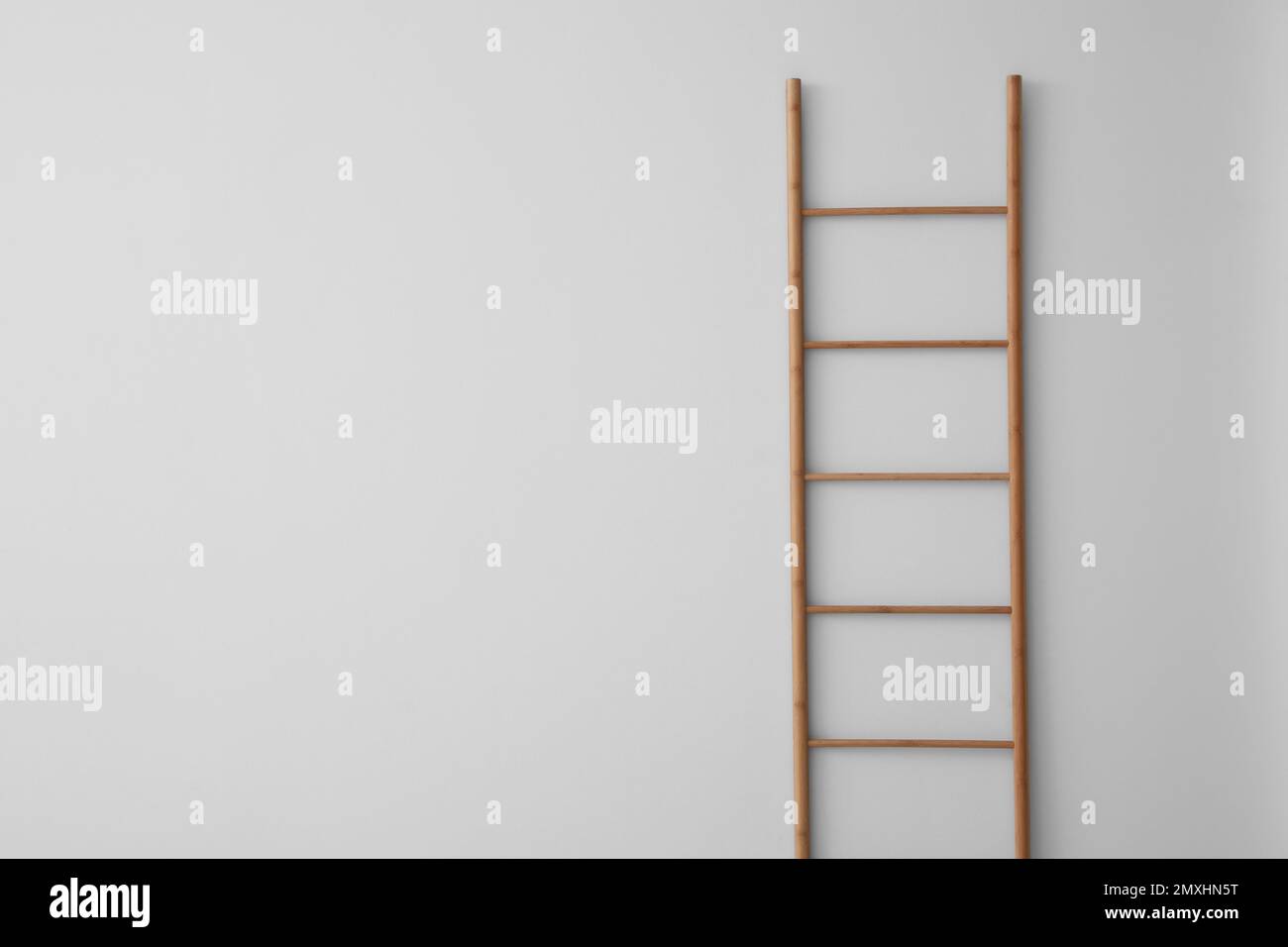Modern wooden ladder on white background. Space for text Stock Photo ...