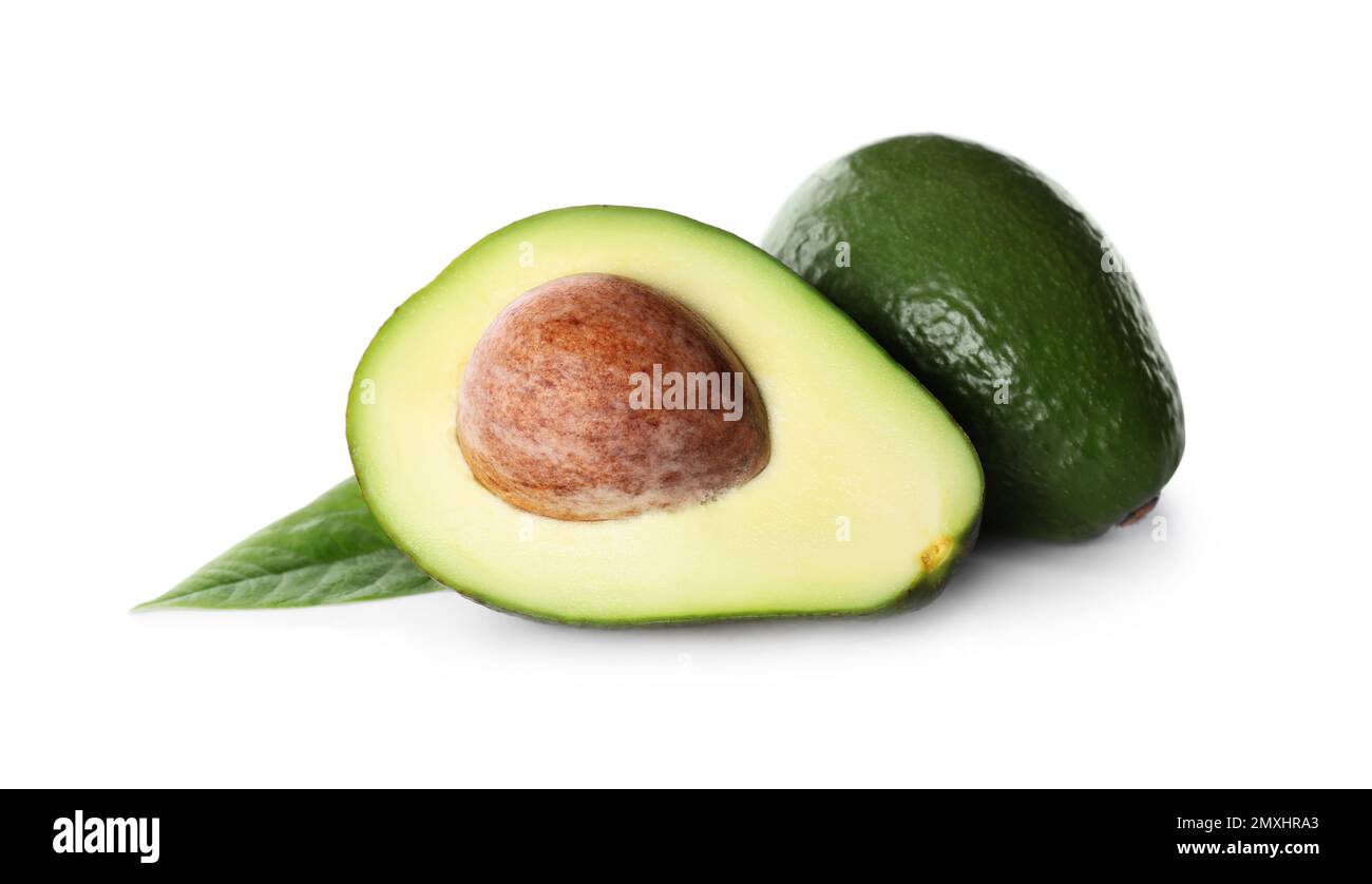 Whole and cut avocados isolated on white Stock Photo - Alamy