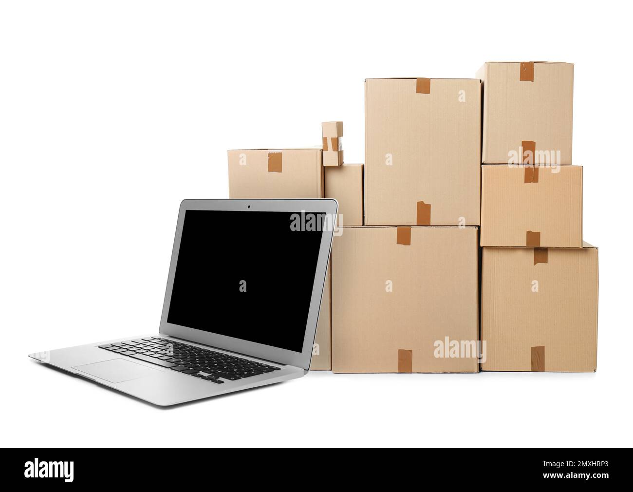 Online selling. Laptop and parcels on white background Stock Photo