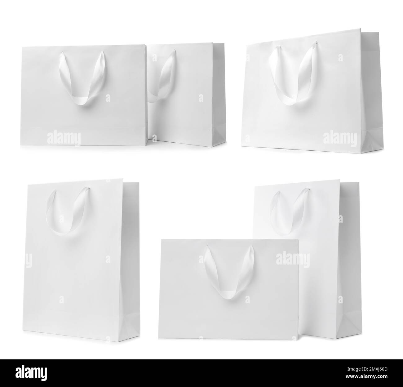 Set with paper shopping bags on white background Stock Photo Alamy