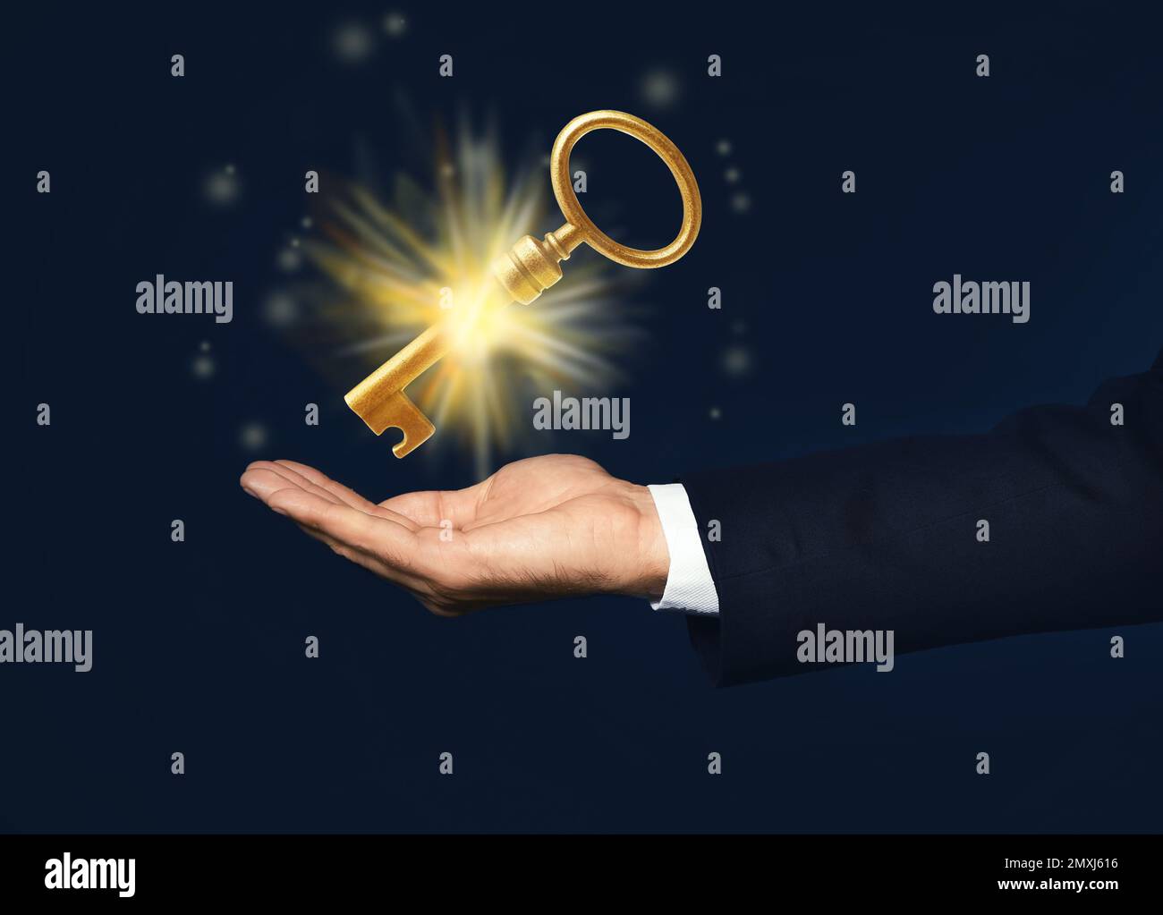 Businessman holding golden key hi-res stock photography and images - Alamy