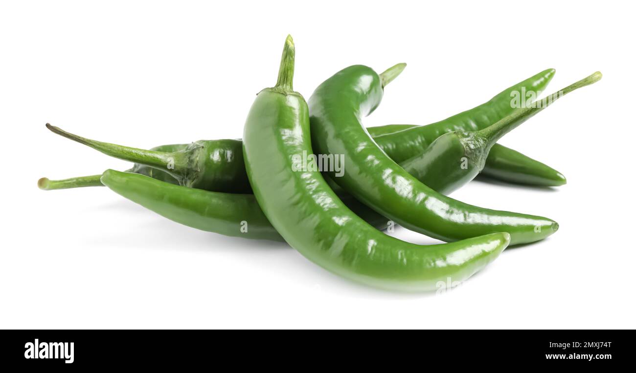 Green hot chili peppers on white background Stock Photo - Alamy