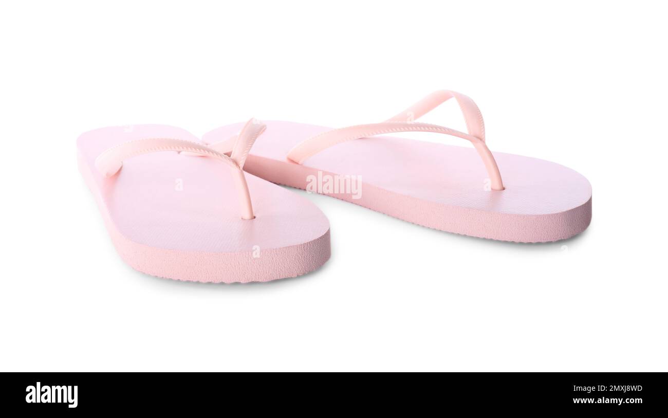Light pink flip flops isolated on white. Beach accessory Stock Photo