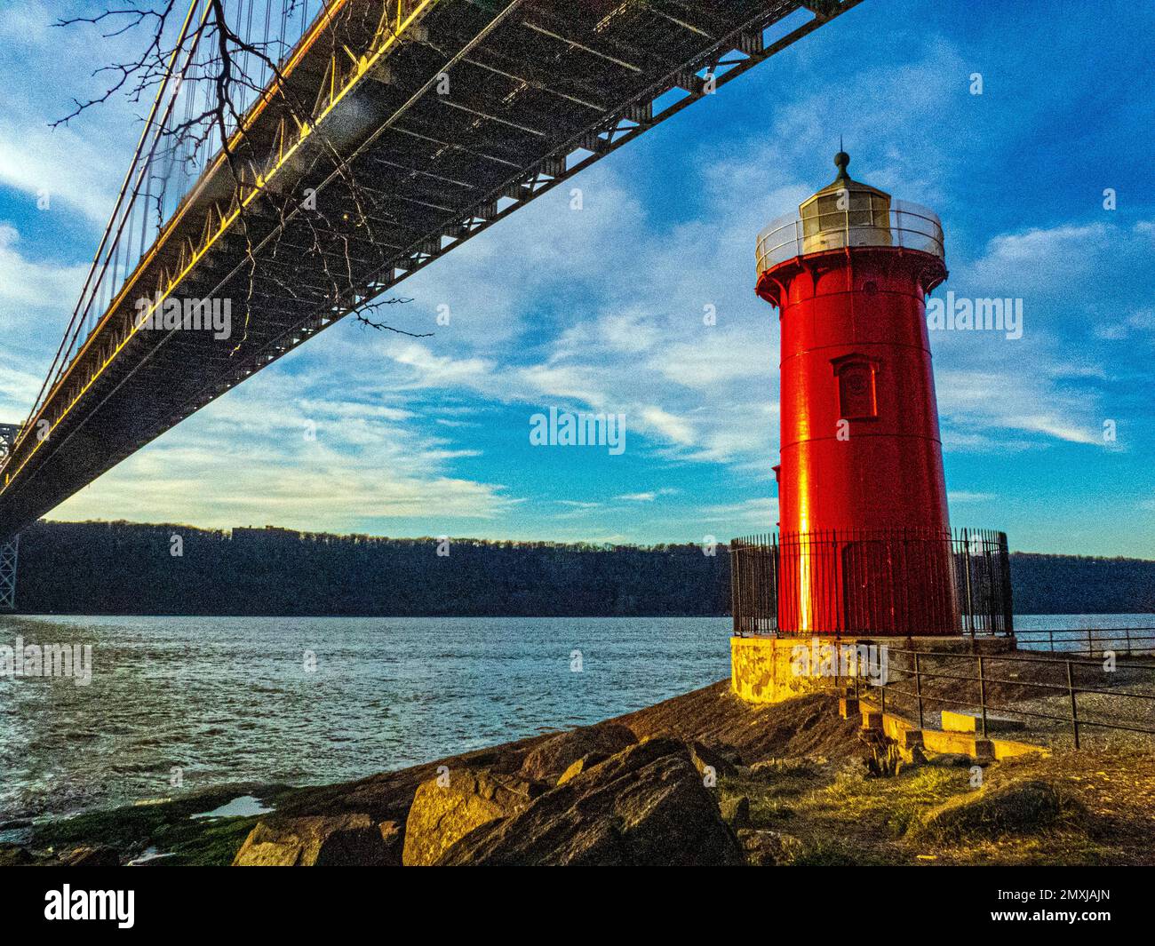 New York, NY, USA. 2nd Feb, 2023. The Little Red Lighthouse, officially Jeffrey's Hook Light in Fort Washington Park along the Hudson River in Manhattan, New York City, under the George Washington Bridge at sunset on 02 Feb 2023 (Credit Image: © Debra L. Rothenberg/ZUMA Press Wire) EDITORIAL USAGE ONLY! Not for Commercial USAGE! Stock Photo