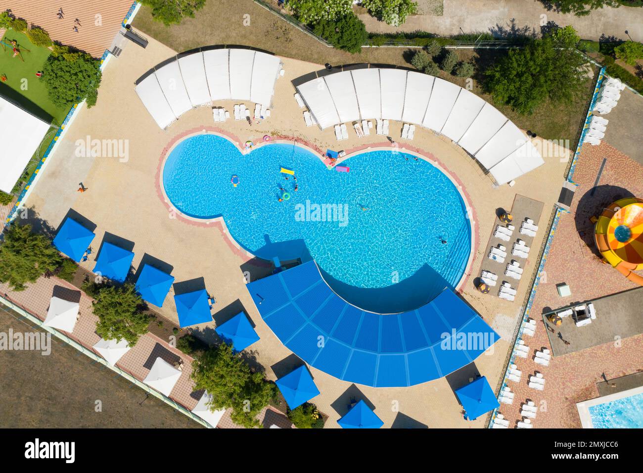 Aerial view of swimming pool on sunny day Stock Photo - Alamy