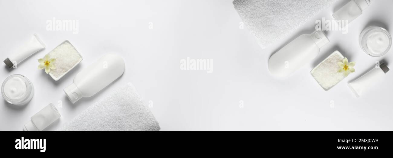 Flat lay composition with cosmetic products on white background, space ...