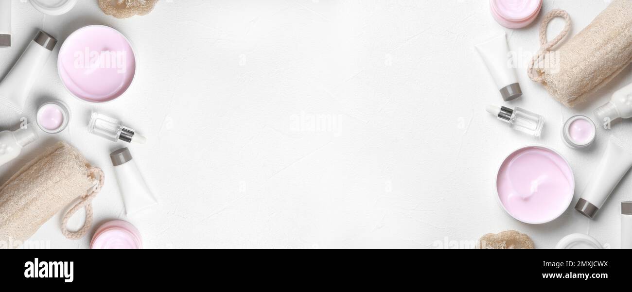 Flat lay composition with cosmetic products and space for text on white ...