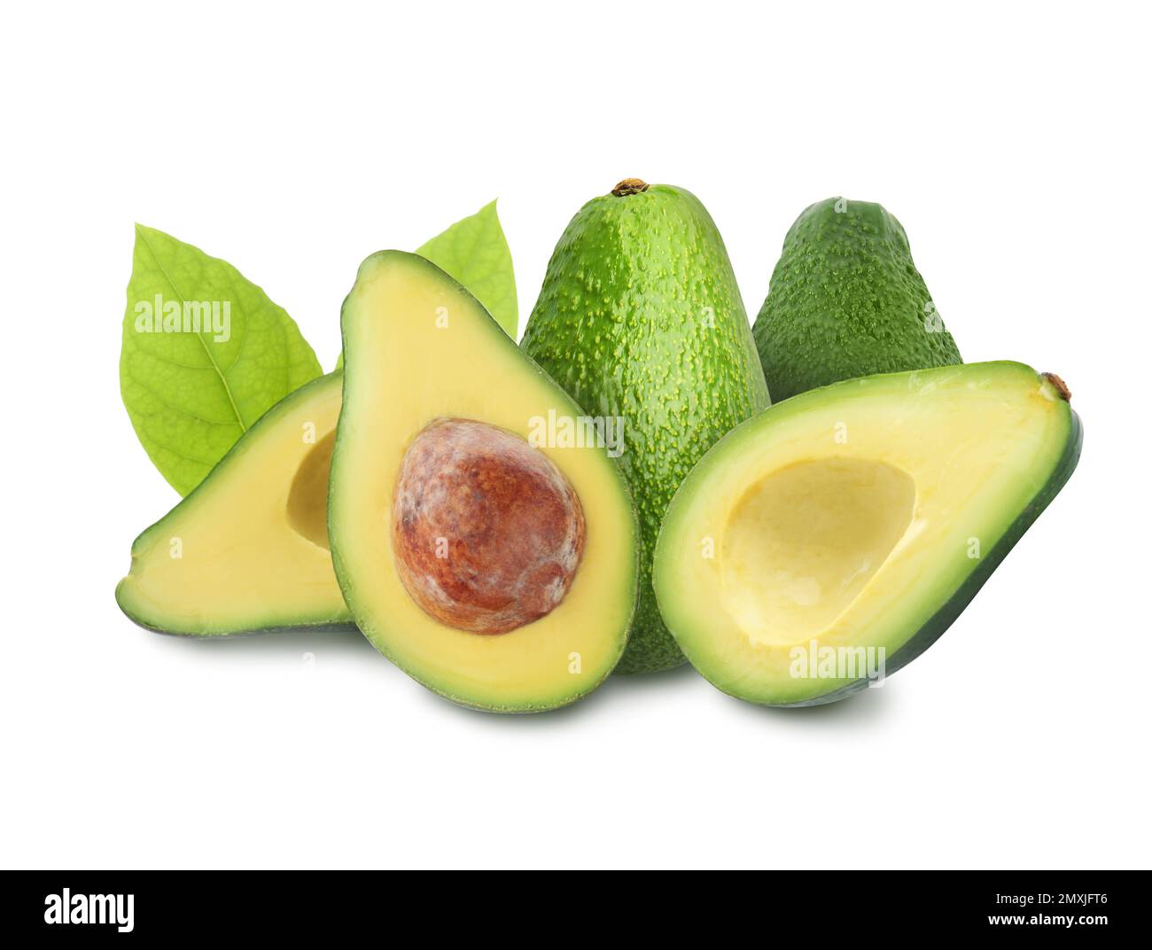 Cut and whole fresh avocados on white background Stock Photo - Alamy