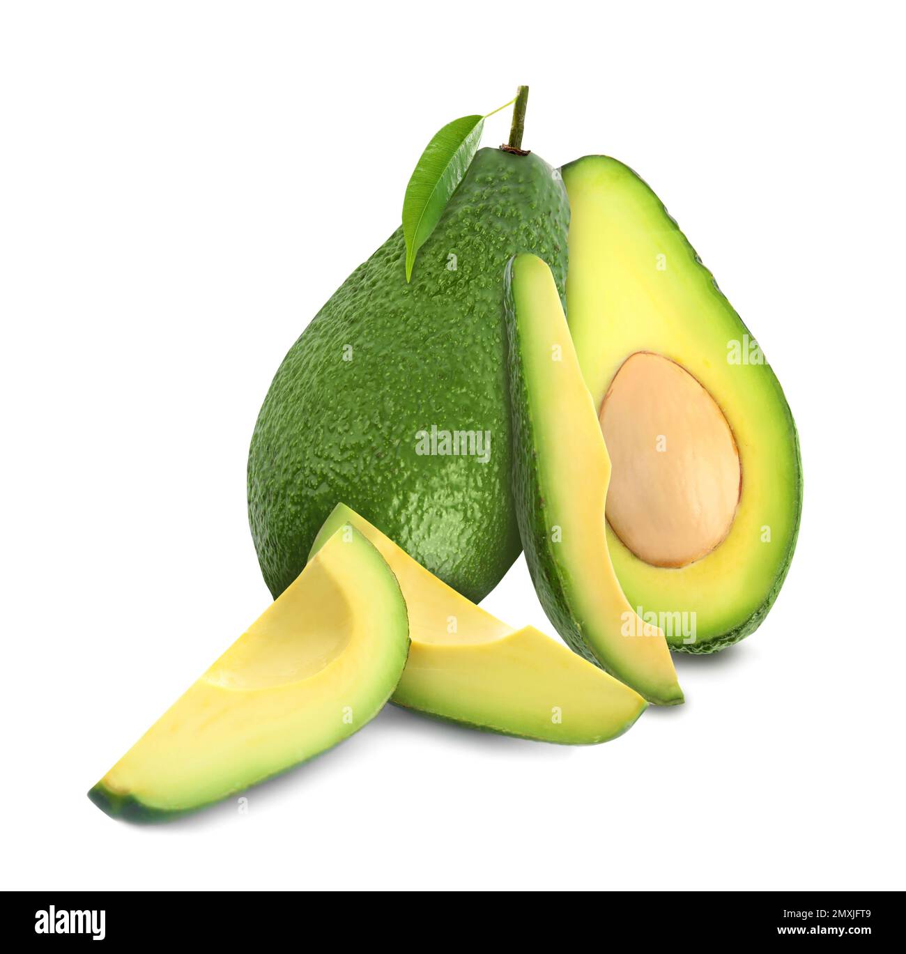 Cut and whole fresh avocados on white background Stock Photo - Alamy