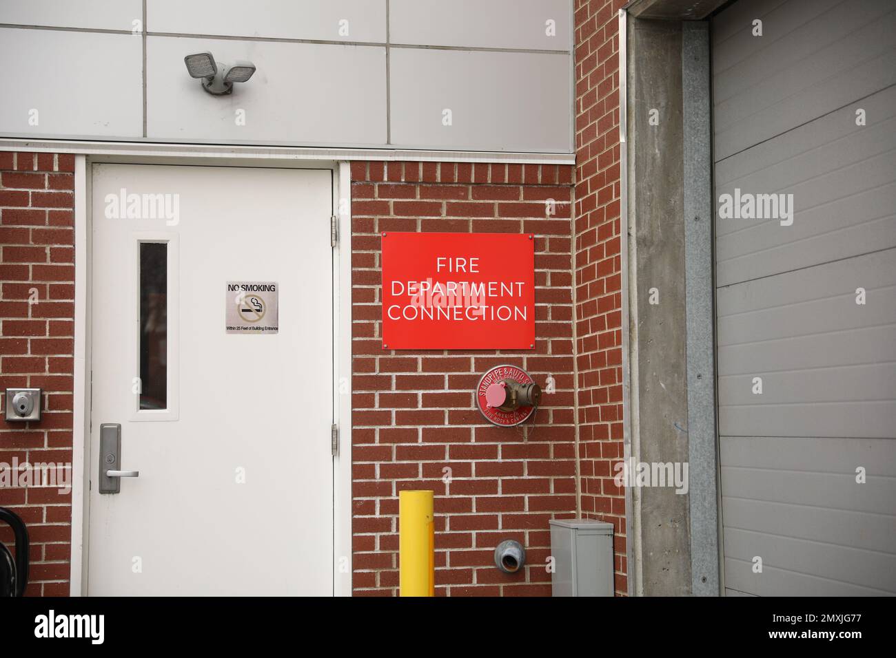 Fire alarm and department warning signs Stock Photo