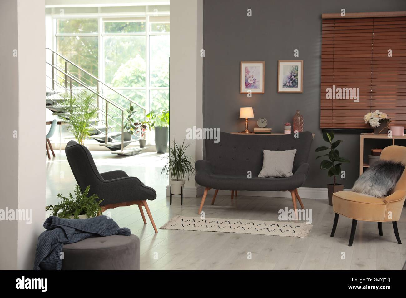 Stylish living room and hall in spacious house. Interior design Stock ...
