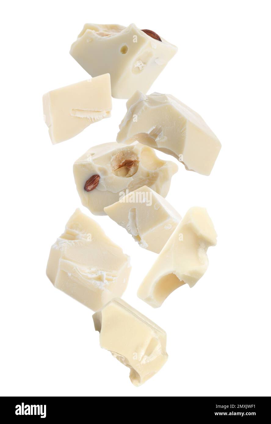 Delicious chocolate chunks falling on white background Stock Photo