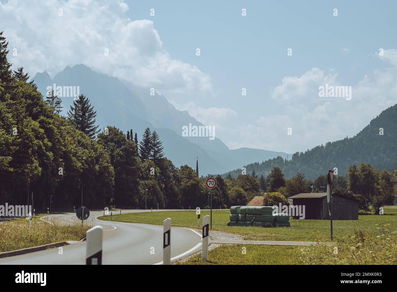 A sunny landscape view with misty and foggy mountain background Stock ...