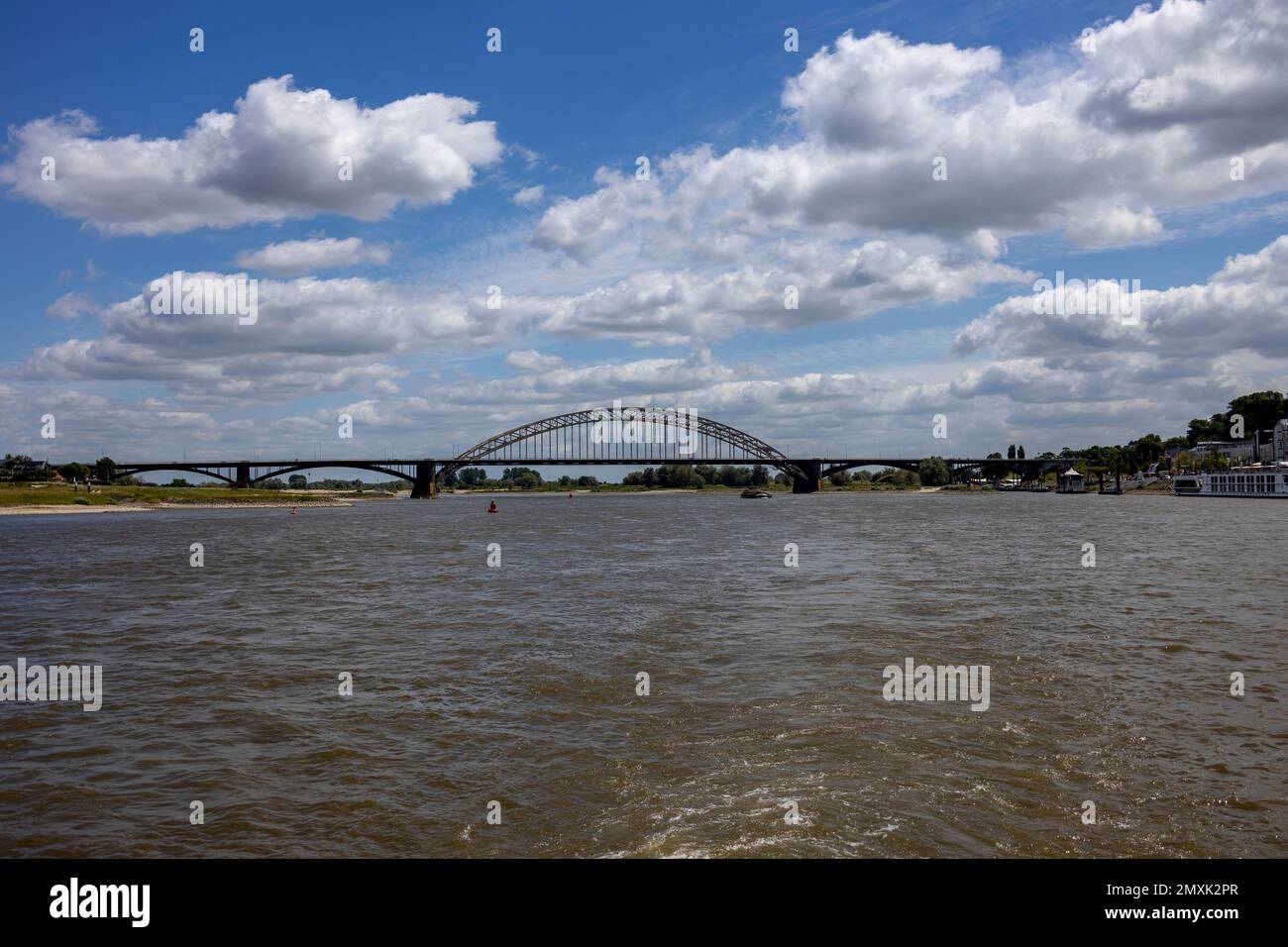 Distant view of Oversteek bridge seen from the water. Stock Photo