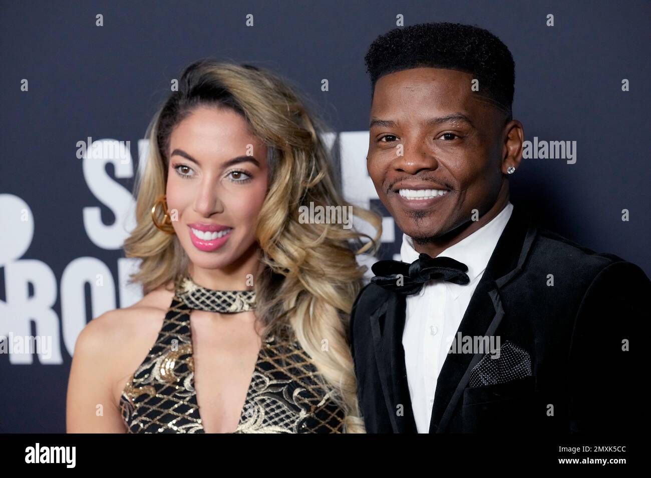 Brooke Ashley Hall, left, and Marco Hall arrive at MusiCares Person of