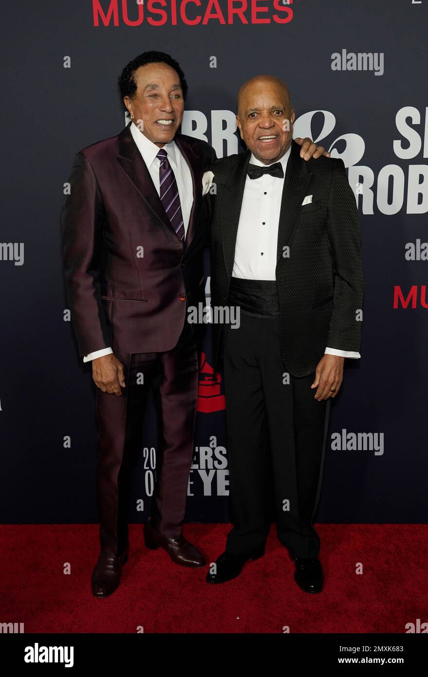 Smokey Robinson, left, and Berry Gordy arrive at MusiCares Person of(00)
