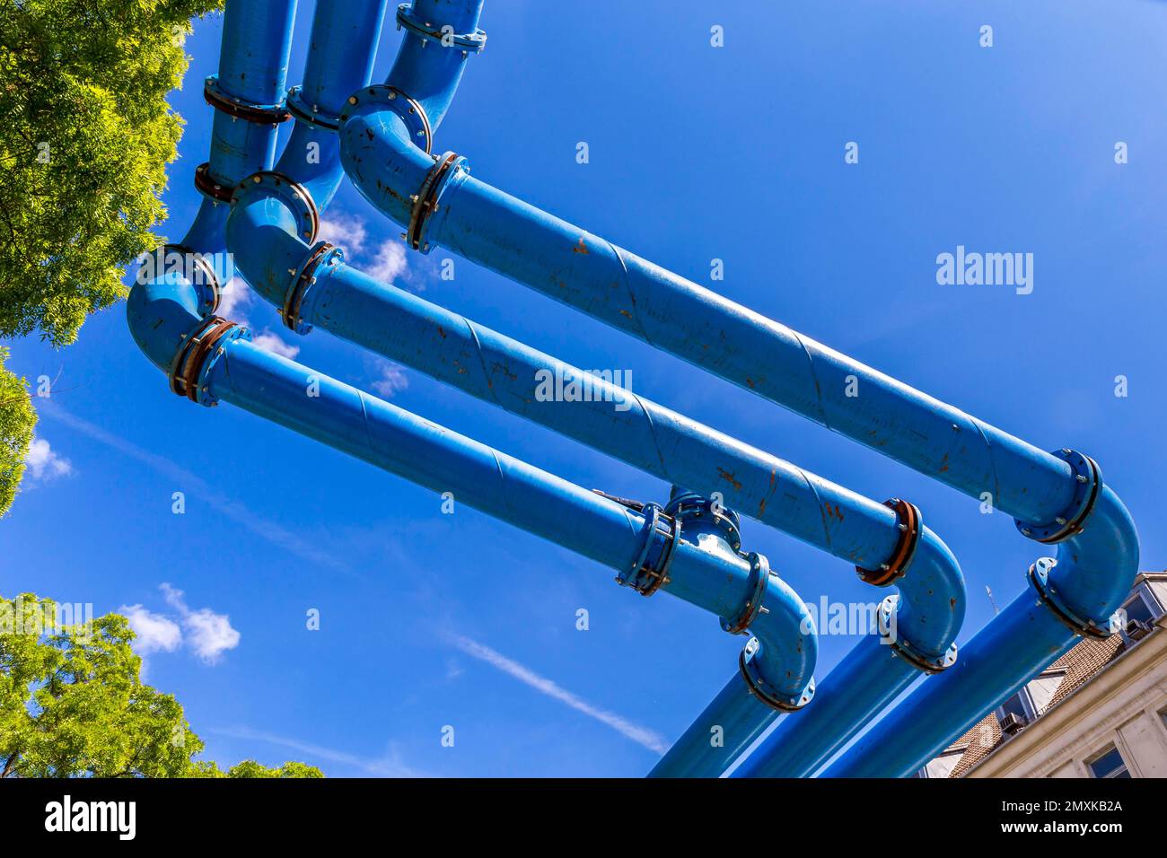 Construction site, blue pipes of a supply line on a construction site