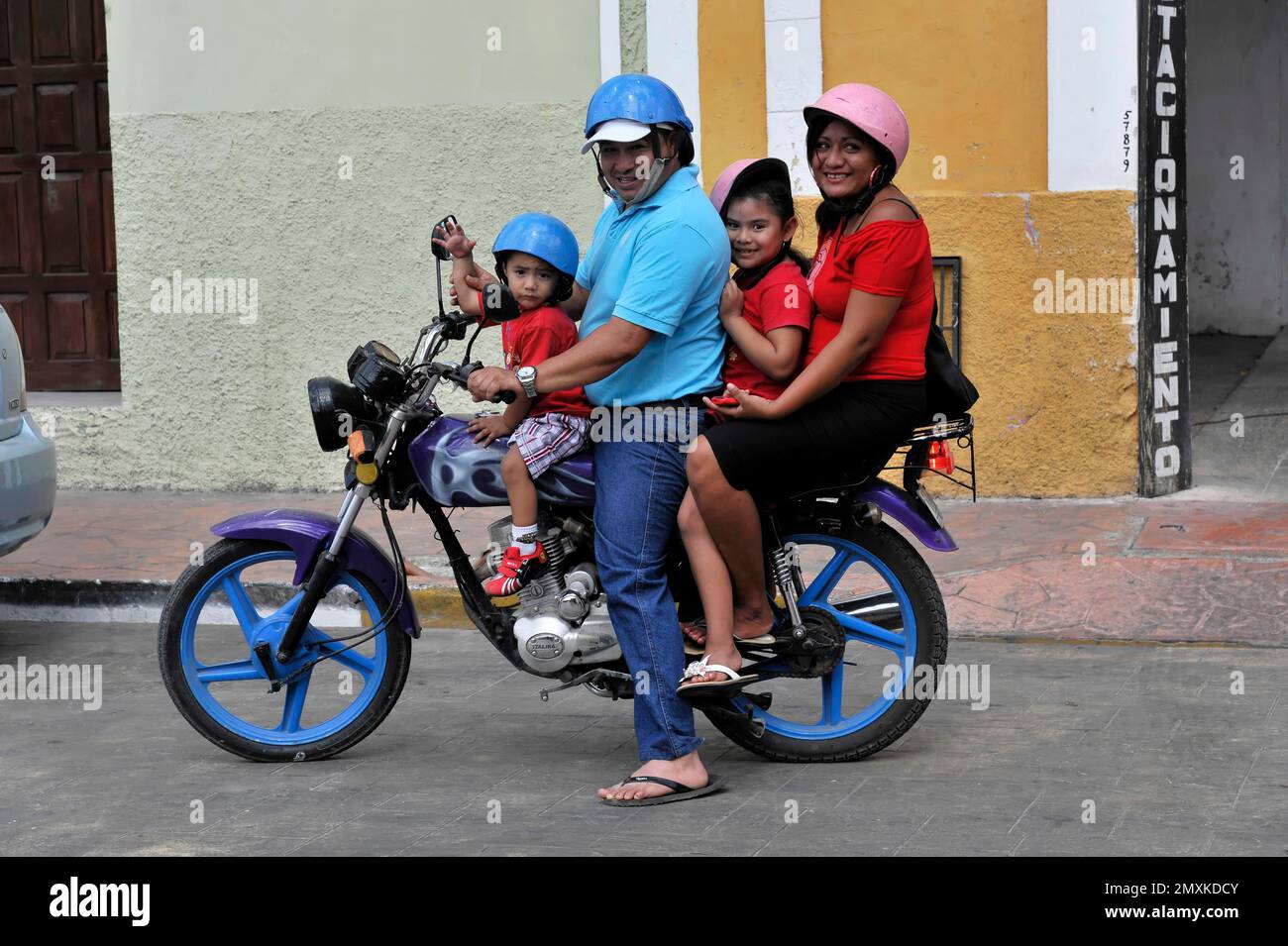 Family outing on the motorbike, at Plaza Mayor, Merida, Yucatan, Mexico, Central America Stock Photo