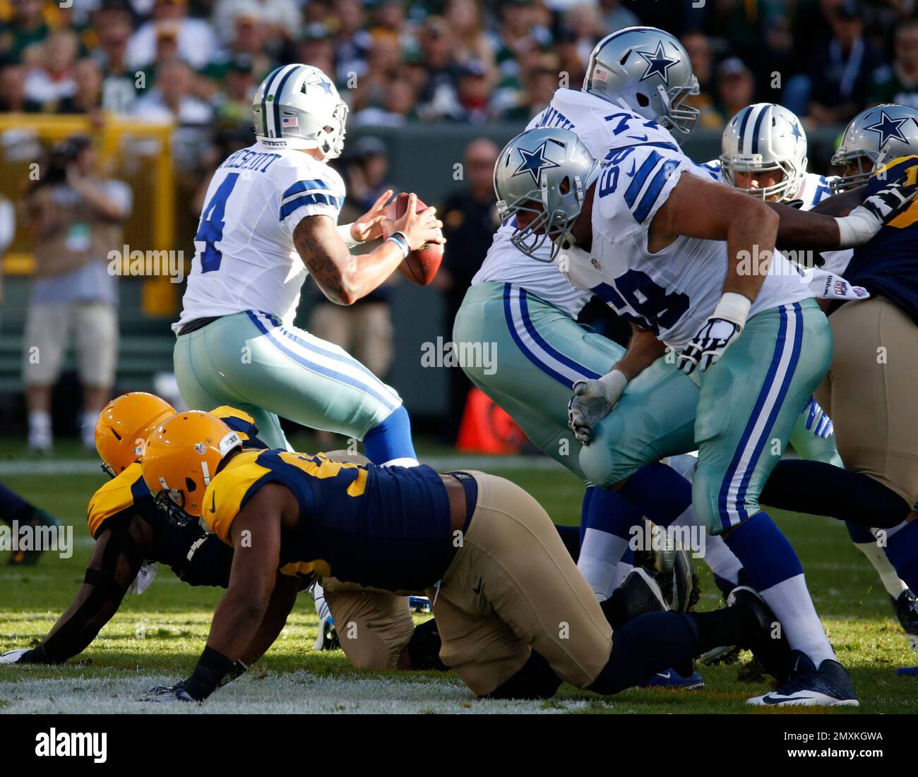 Dallas Cowboys' Dak Prescott throws a completed pass during the first