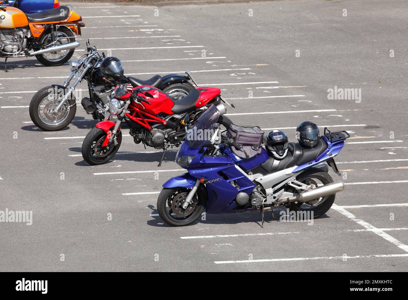 Motorbikes in a car park, Germany, Europe Stock Photo Alamy