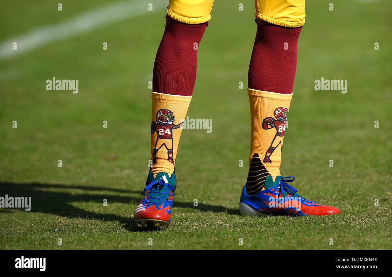 Landover, Maryland, USA. 14th Oct, 2018. Washington Redskins cornerback  Josh Norman (24) has words with Carolina Panthers quarterback Cam Newton  (1) during the NFL game between the Carolina Panthers and the Washington