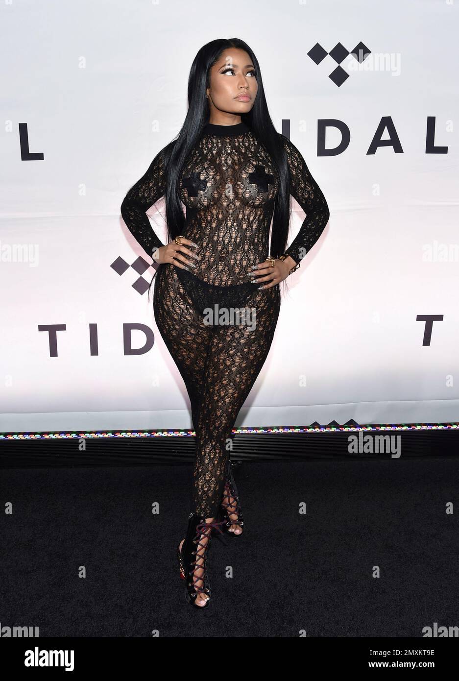 Singer Nicki Minaj attends the Tidal X: 1015 benefit concert, hosted by Tidal and the Robin Hood Foundation, at the Barclays Center on Saturday, Oct. 15, 2016, in New York. (Photo by Evan Agostini/Invision/AP) Stock Photo