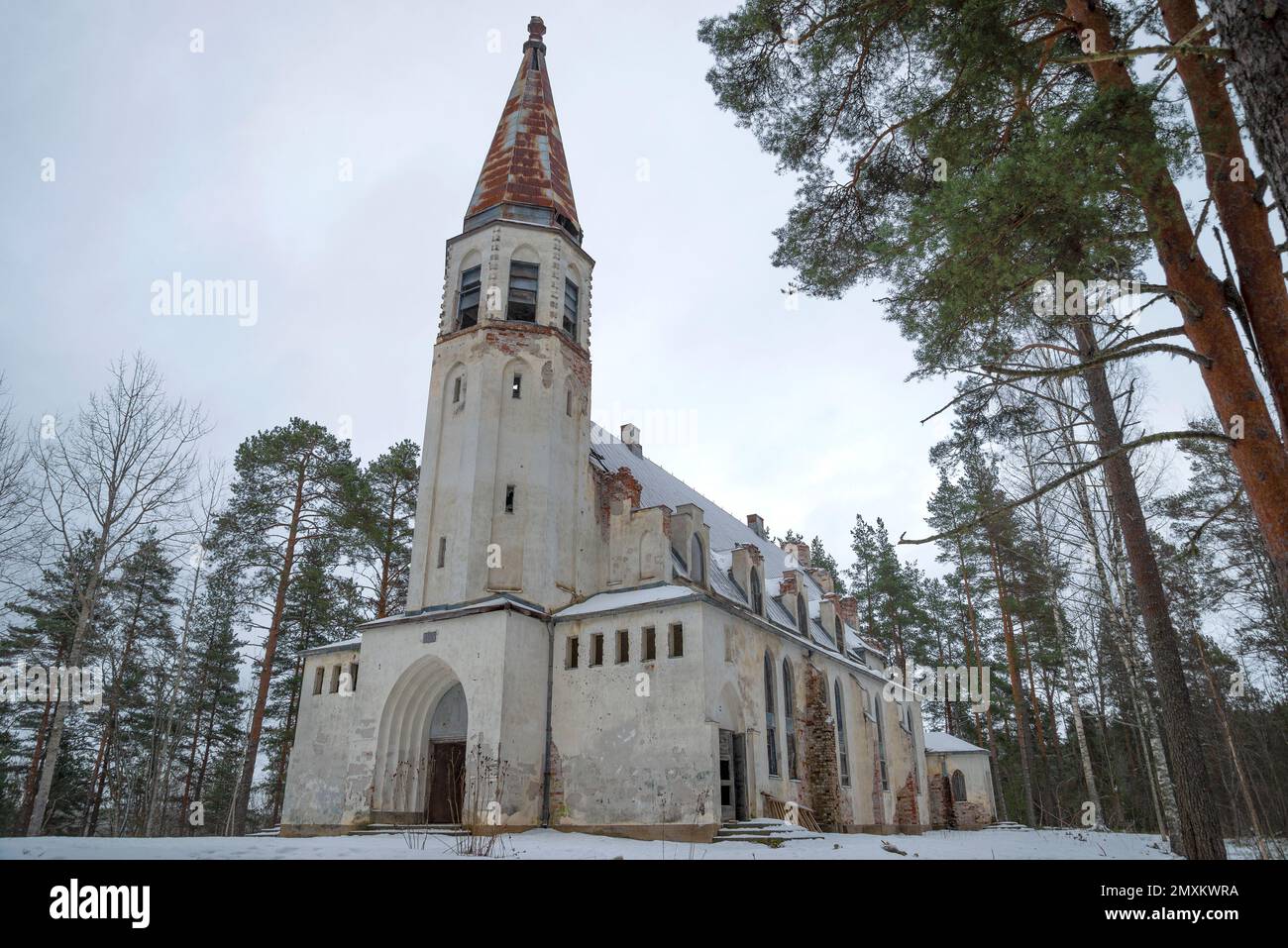 Abandoned Lutheran church Lumivaara on a cloudy February day. Karelia, Russia Stock Photo