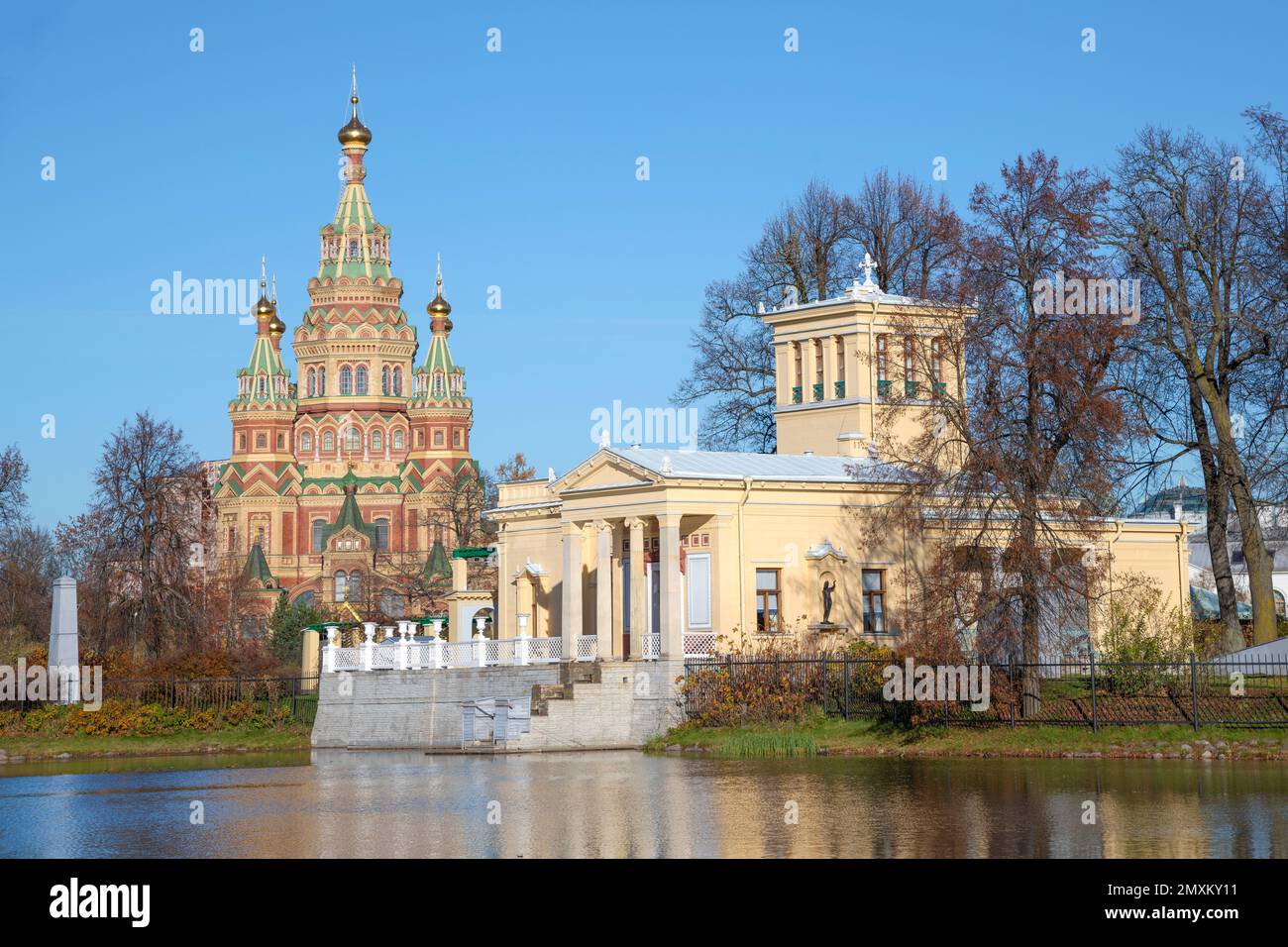 PETRODVORETS, RUSSIA - OCTOBER 25, 2022: View of the ancient Peter and Paul Cathedral and the Tsaritsyn pavilion on a sunny October day Stock Photo