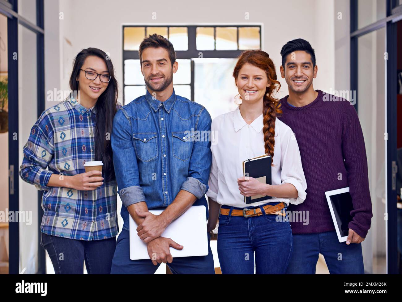 Tell us your design needs. Cropped portrait of a group of young ...