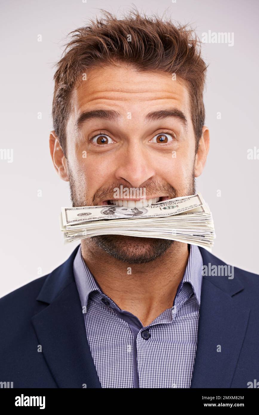Man money stuffed in mouth hi-res stock photography and images - Alamy