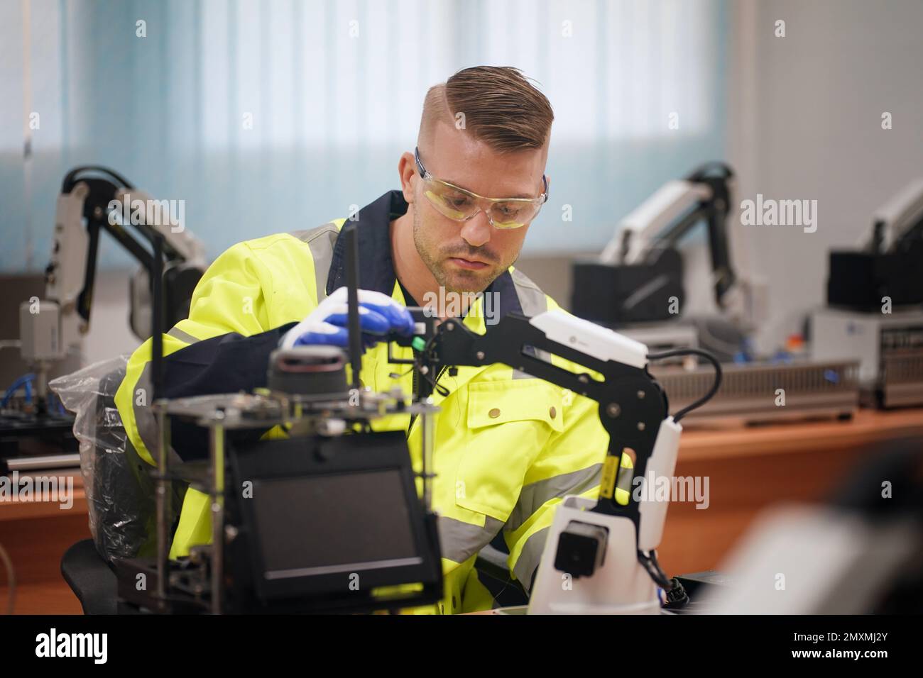 Engineers Maintenance Robot Arm at Lab in a High Tech Research ...