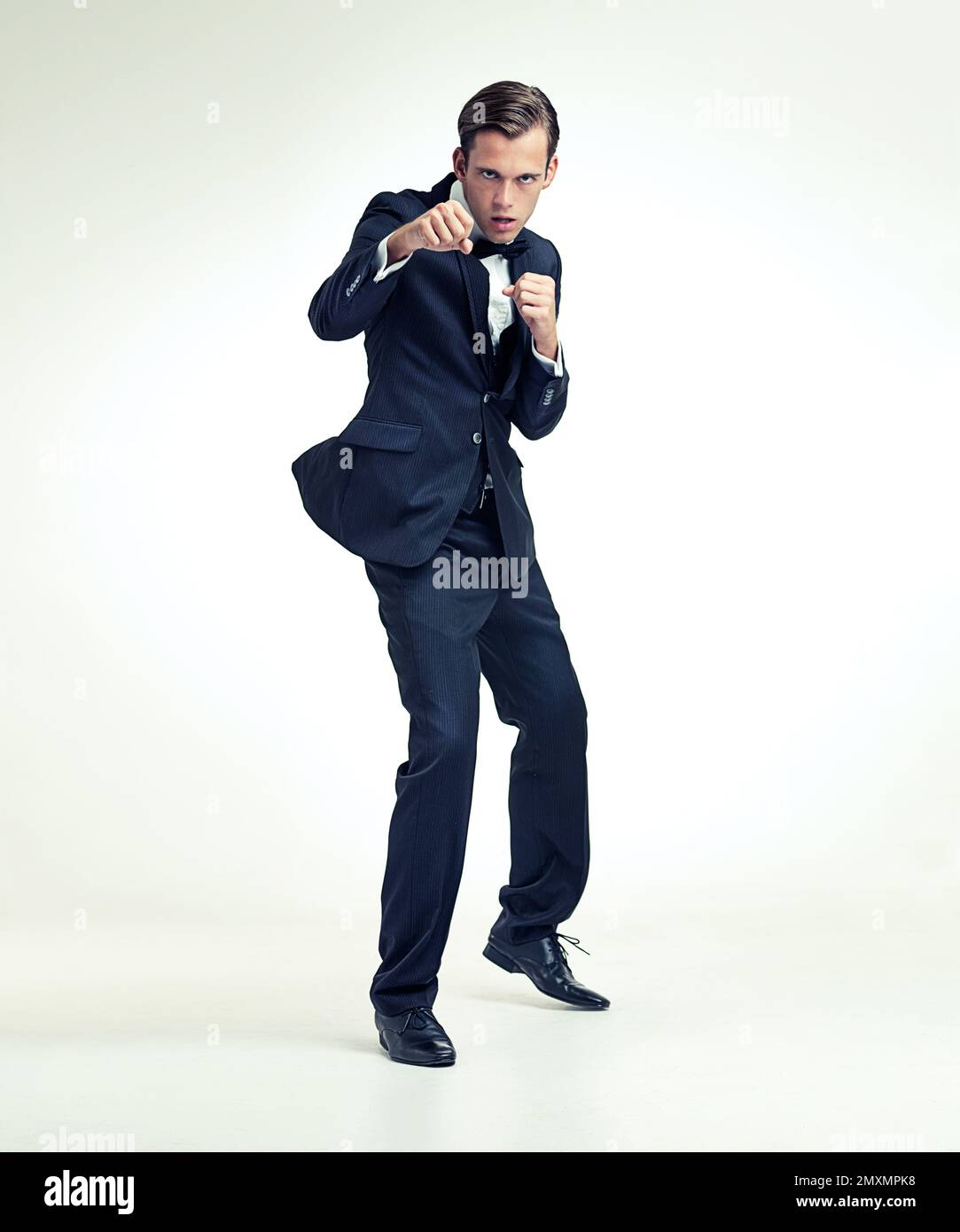 Fight night. A full length studio portrait of a young man in a boxers