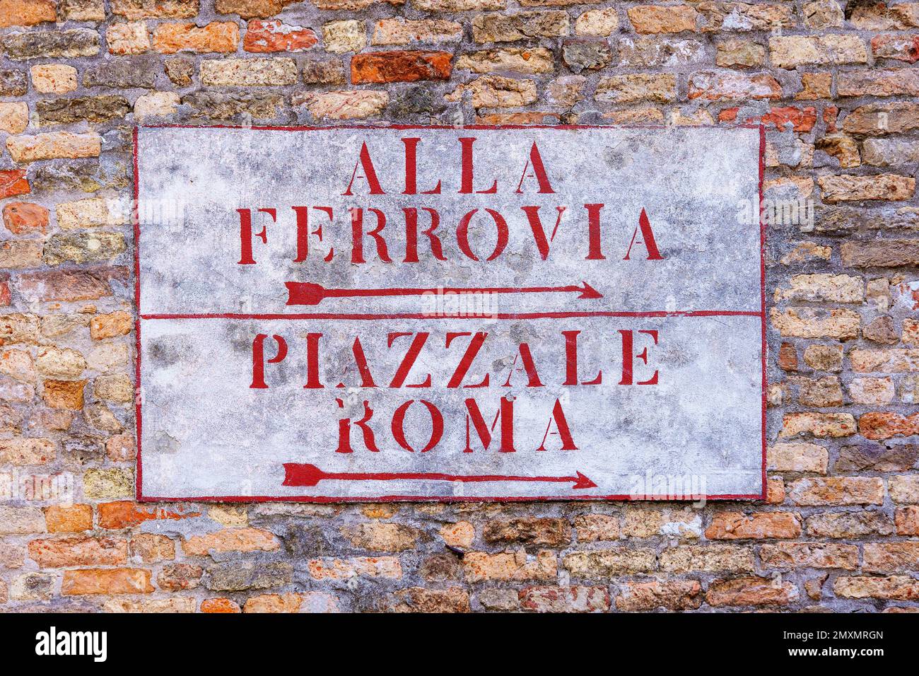 View of a typical directional sign, in Venice, Veneto, Northern Italy. Text is central squares names Stock Photo
