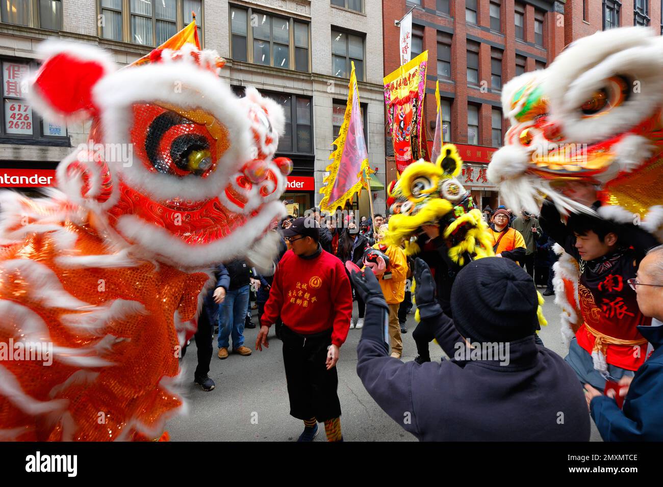 Wong Family and Nam Pai Academy Lion Dance teams meet each other in Boston Chinatown during Spring Festival, Chinese New Year, January 29, 2023. Stock Photo