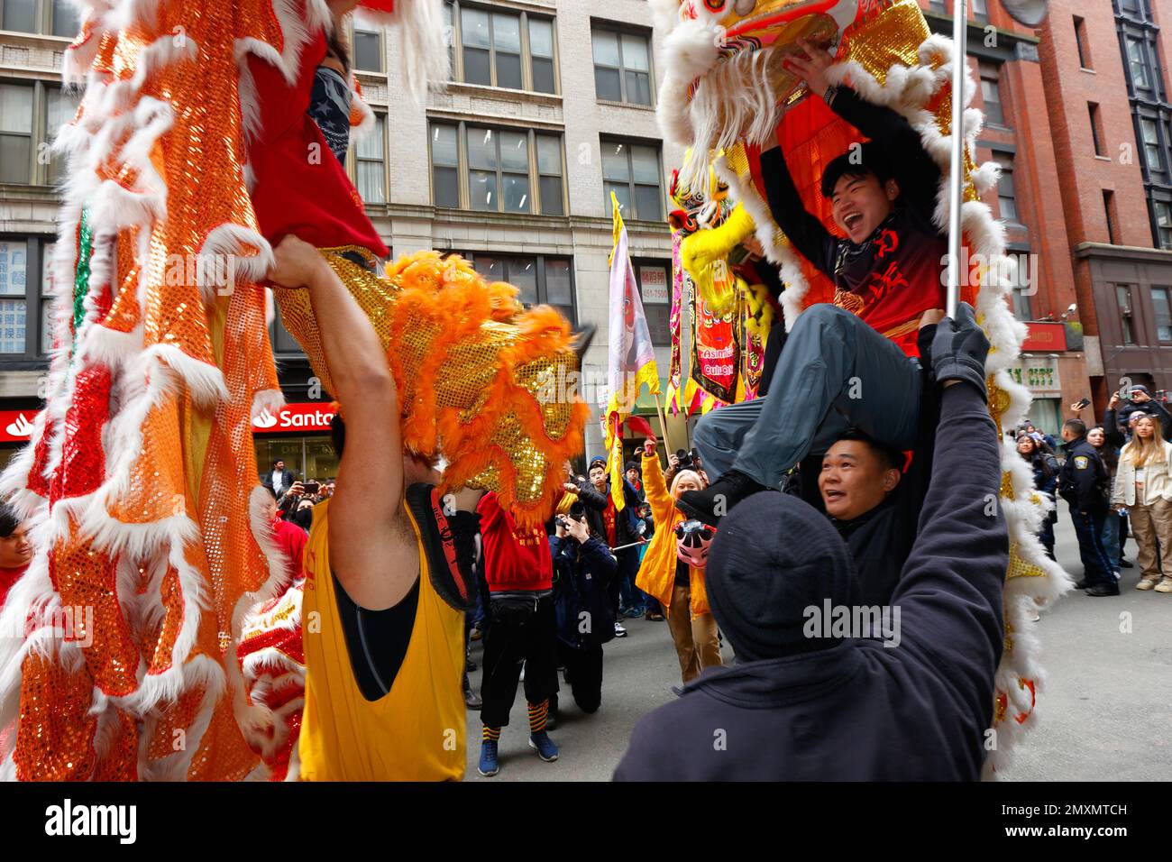 Wong Family and Nam Pai Academy Lion Dance teams meet each other in Boston Chinatown during Spring Festival, Chinese New Year, January 29, 2023.舞獅,波士頓 Stock Photo