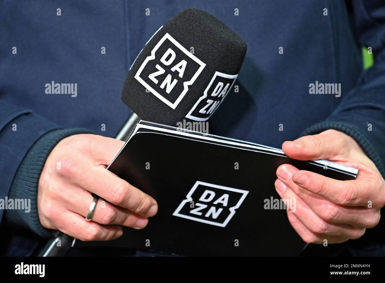 Side motive football broadcast DAZN broadcaster, streaming service, television station. Microphone, close up