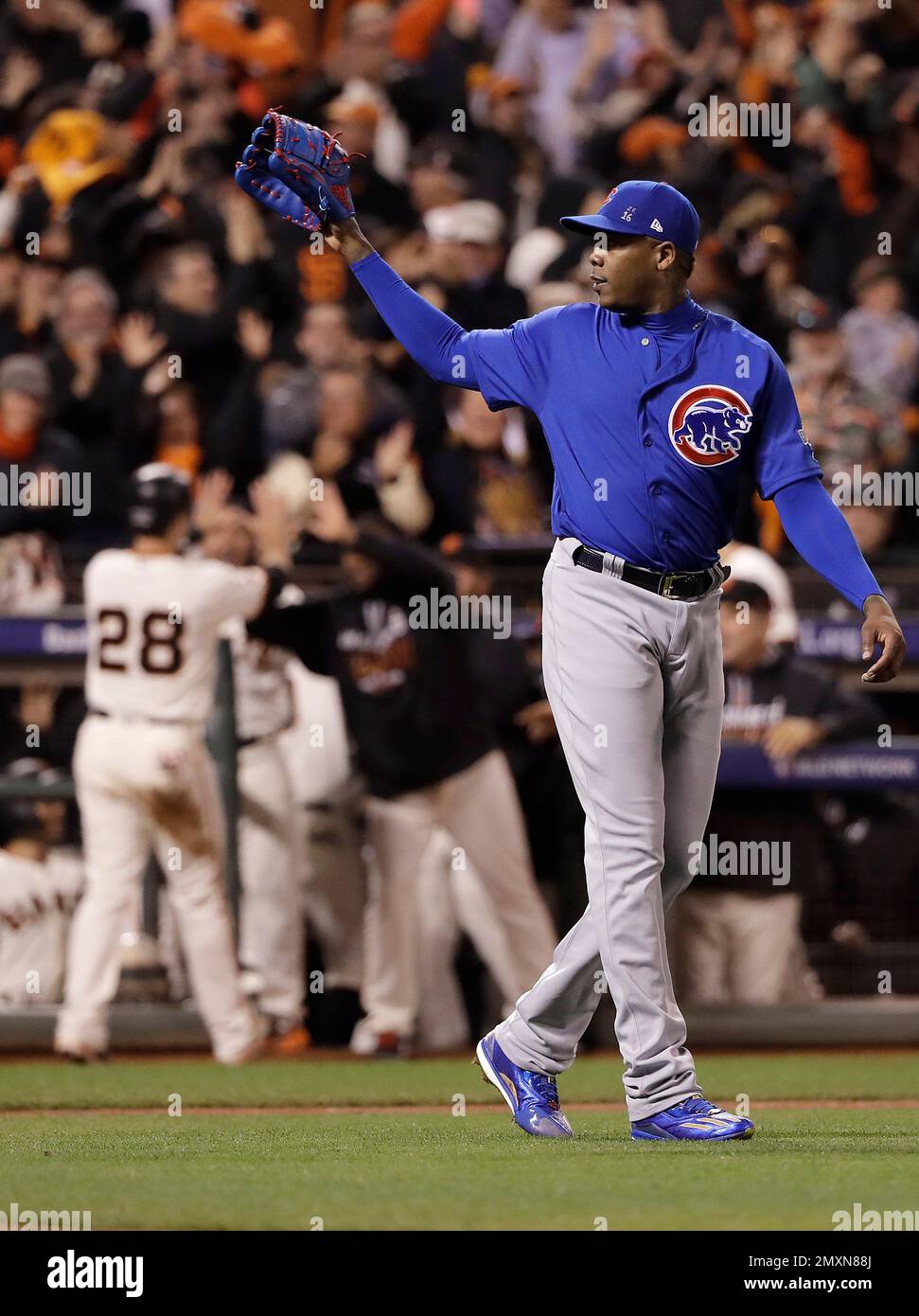 Chicago Cubs pitcher Aroldis Chapman, right, reacts as San Francisco ...