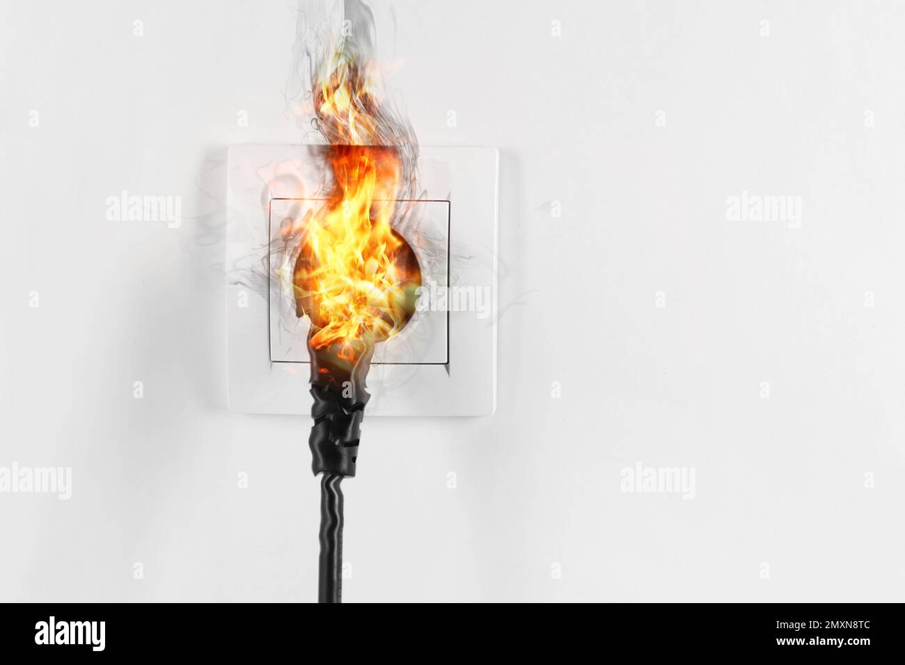Electrical short circuit leading to plug ignition Stock Photo Alamy