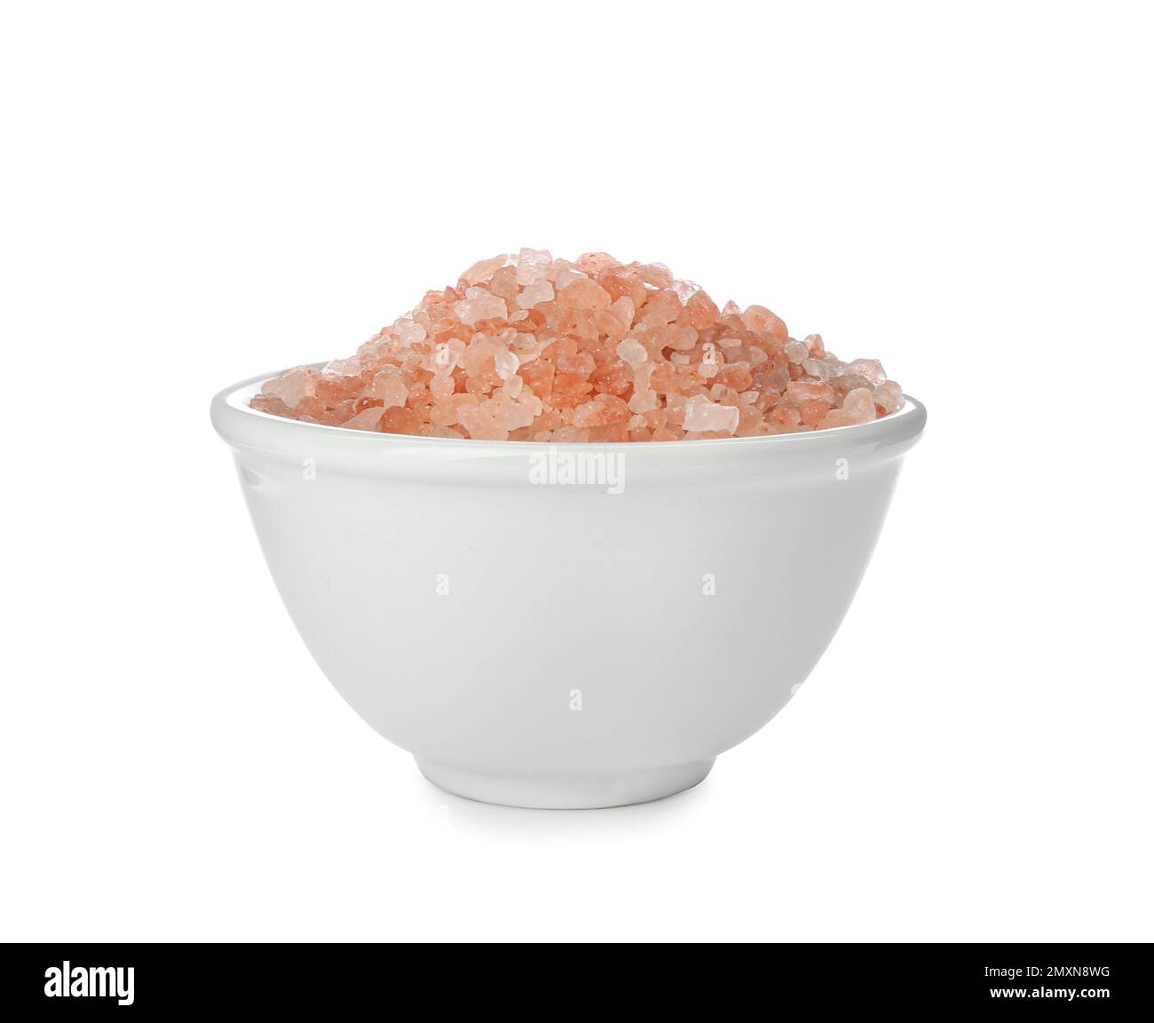 Pink himalayan salt in bowl isolated on white Stock Photo