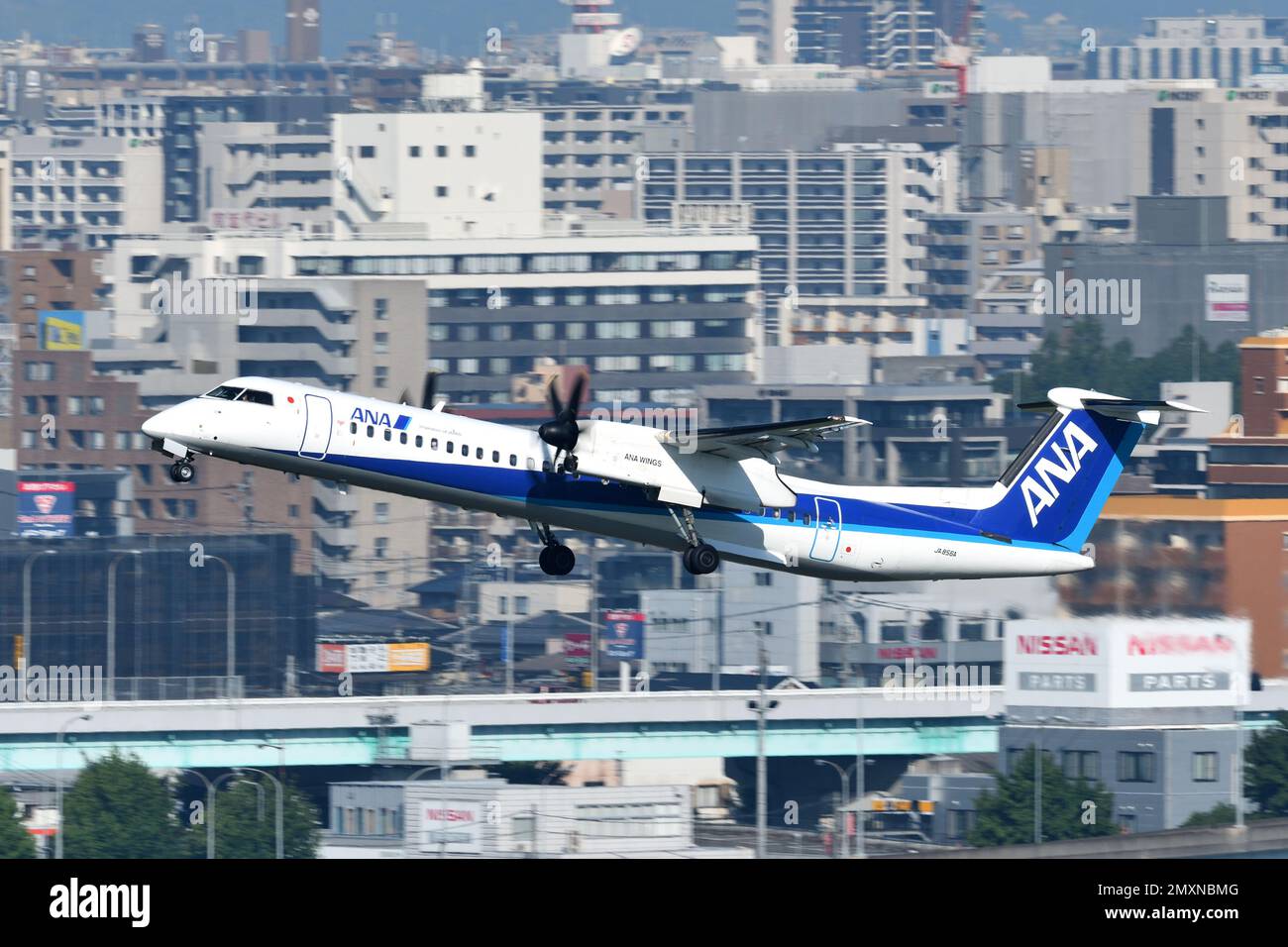 Fukuoka Prefecture, Japan - July 02, 2022: ANA Wings De Havilland Canada Dash 8-400 (JA856A) passenger plane. Stock Photo