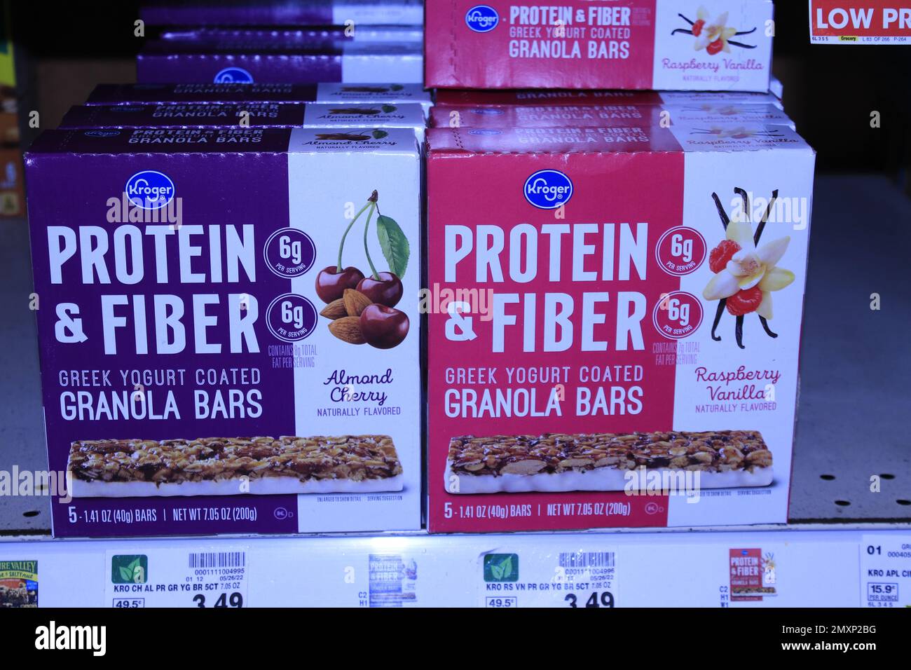 Kroger PROTIEN & FIBER Granola Bars in boxes on a shelf shot closeup