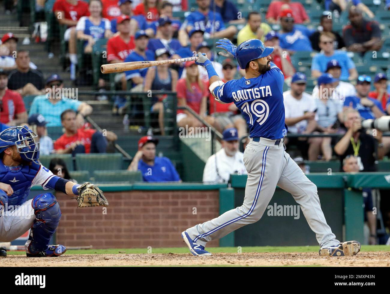 Texas Rangers catcher Jonathan Lucroy and Toronto Blue Jays' Jose ...
