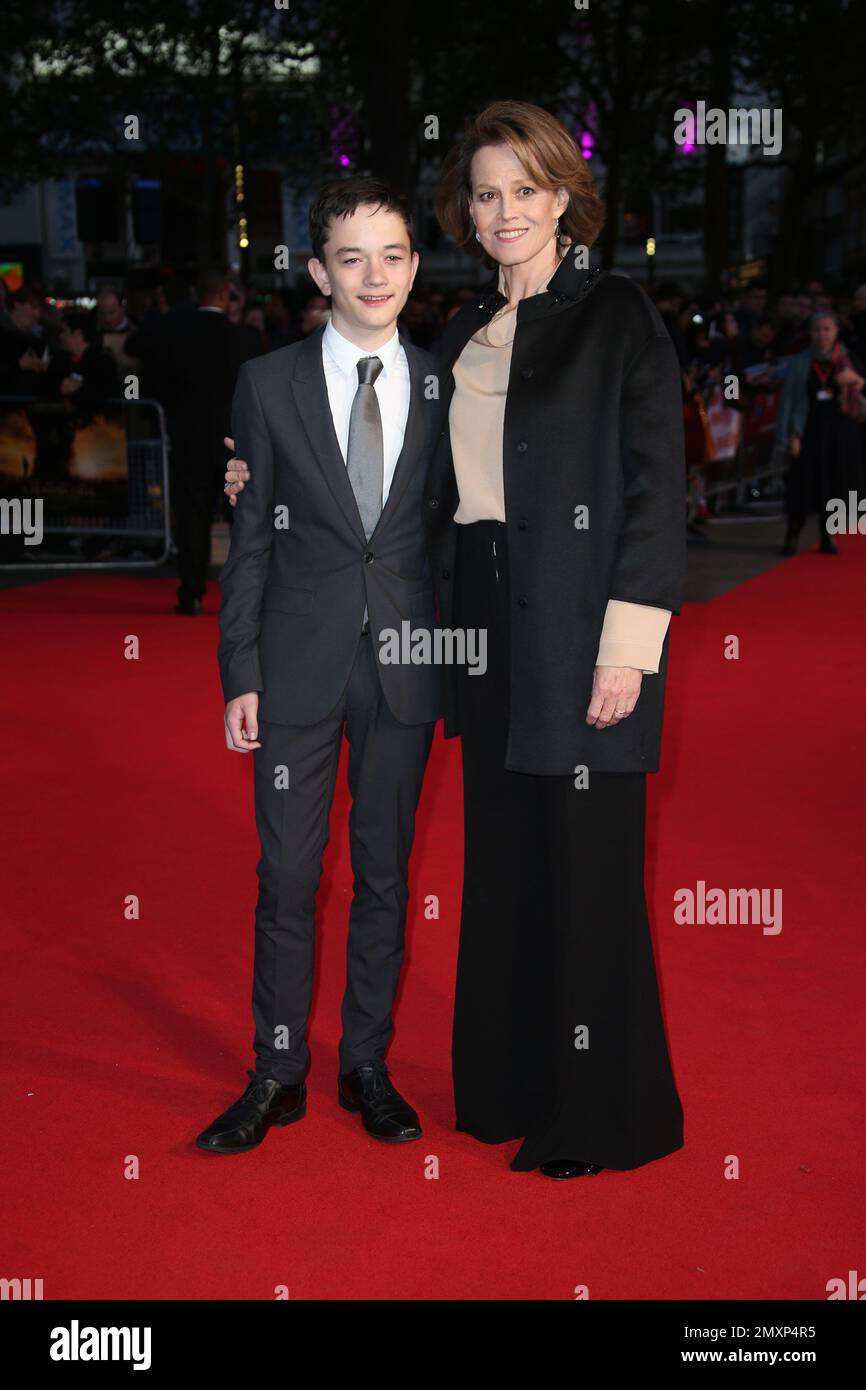 Actors Lewis MacDougall and Sigourney Weaver pose for photographers ...