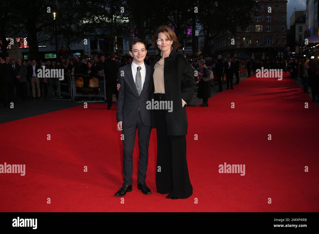 Actors Lewis MacDougall and Sigourney Weaver pose for photographers ...