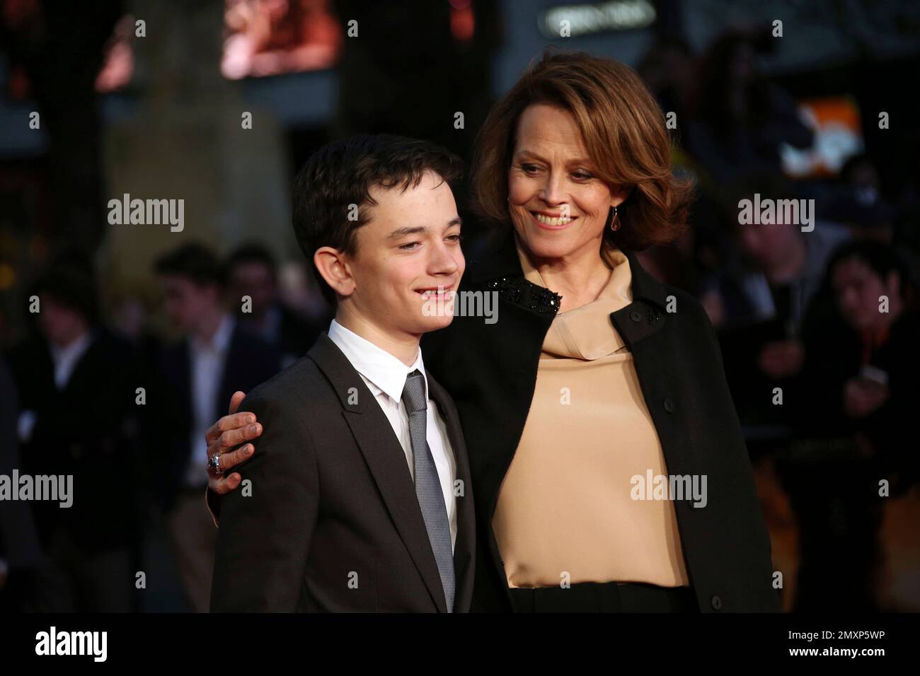 Actors Lewis MacDougall and Sigourney Weaver poses for photographers ...