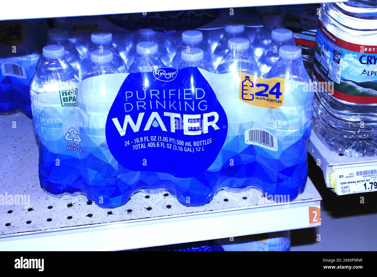 https://c8.alamy.com/comp/2MXP9RW/kroger-purified-water-shot-closeup-in-bottles-on-a-shelf-2MXP9RW.jpg