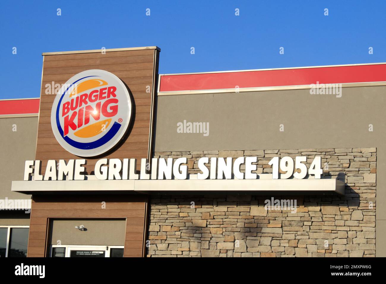 Burger King fast food Restaurant that's bright and colorful with blue