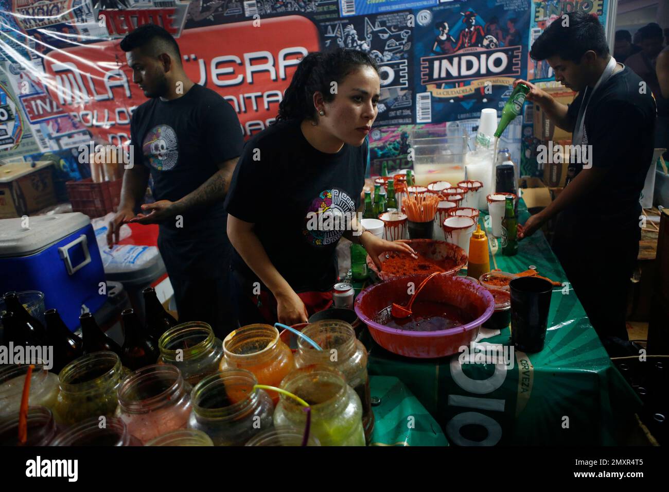 Michelada makers take orders from customers at the first Michelada Expo