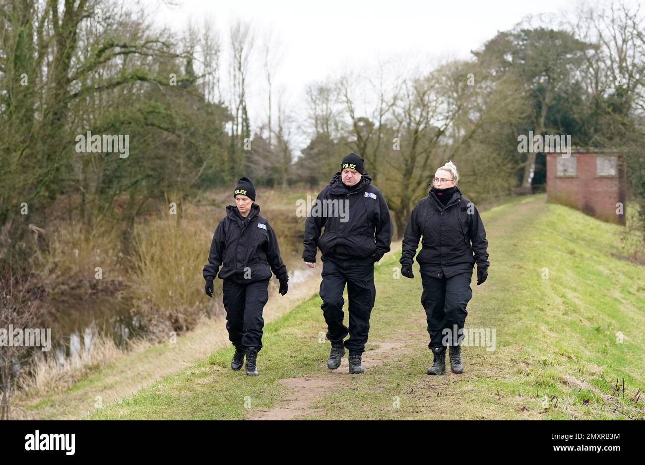 Police officers in St Michael's on Wyre, Lancashire, as police continue their search for missing woman Nicola Bulley, 45, who was last seen on the morning of Friday January 27, when she was spotted walking her dog on a footpath by the nearby River Wyre. Picture date: Saturday February 4, 2023. Stock Photo